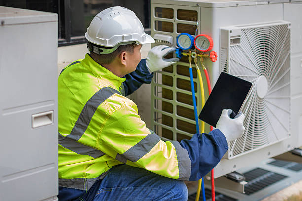 Professional Hvac technician working in Needville, TX